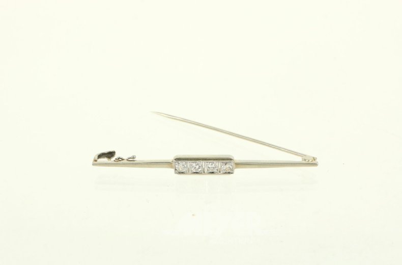 Zarte Stabnadel, besetzt mit 4 kl. Brillanten von zus. ca. 0,25ct