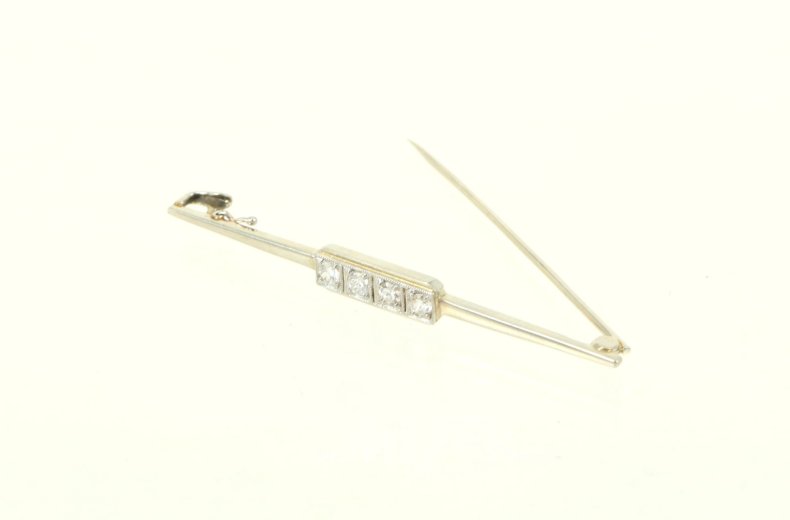 Zarte Stabnadel, besetzt mit 4 kl. Brillanten von zus. ca. 0,25ct