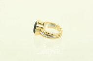 moderner Ring mit einem gr. facettierten Turmalin