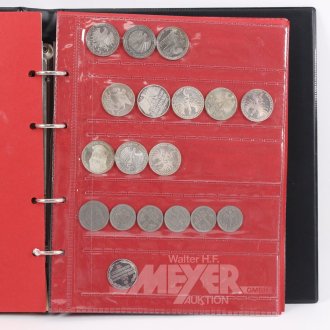 Münzalbum mit Silbermünzen