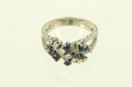 Ring mit 7 kl. Brillanten u. 6 kl. Saphiren