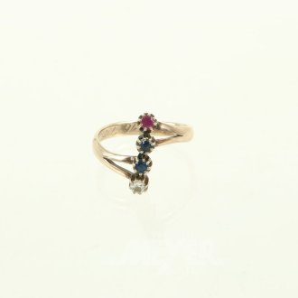 Ring mit 1 Brillant, 1 Rubin u. 2 Saphiren