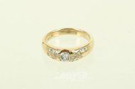 Damenring mit 1 Brillant von ca. 0,20ct u. 18 kl. Diamanten