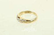 Damenring mit 1 Brillant von ca. 0,20ct u. 18 kl. Diamanten