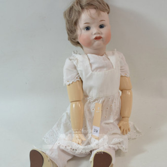 Puppe mit Porzellankopf