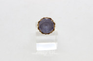 Ring, 585er GG, besetzt mit 1 gr. lila