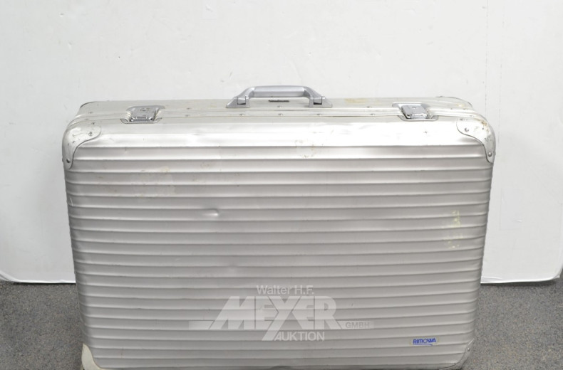 2 gr. Reisekoffer RIMOWA, schwarz u. silber,