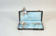 2 Löffel, 800er Silber, ca. 95 g.