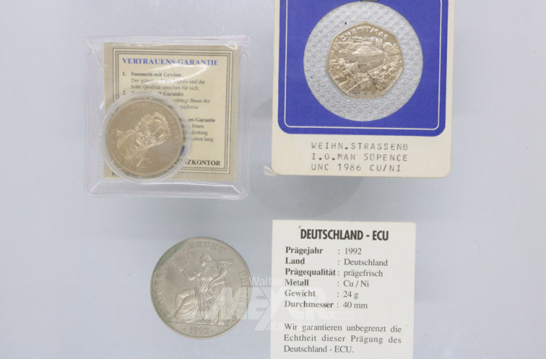 12 Münzen und Medaillen