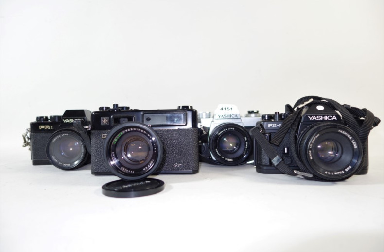 4 versch. Spiegelreflexkameras: