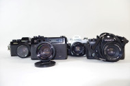 4 versch. Spiegelreflexkameras: