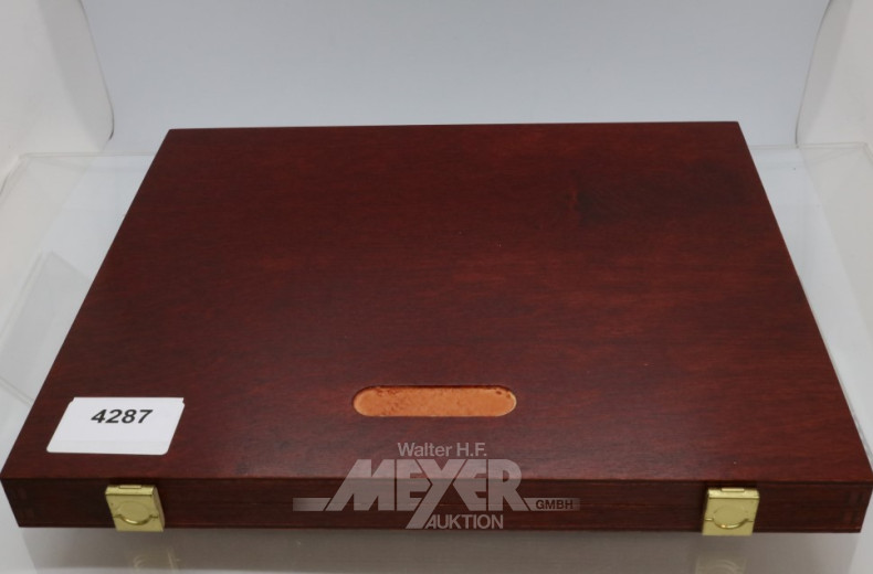 Münz-Kassette u. 10 Münzen