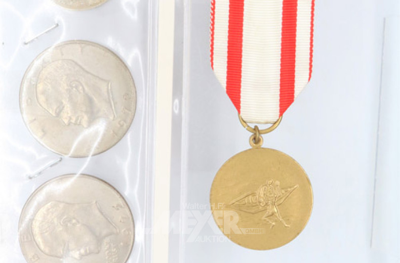 3 One Dollar Münzen, 1 Flutorden,