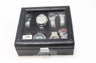 8 Herrenarmbanduhren in einer Uhrenbox