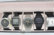 Uhrenbox mit 5 Herrenarmbanduhren u.a.