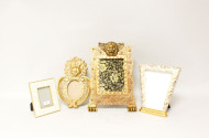 4 versch. Fotorahmen, goldfarbiges Dekor,