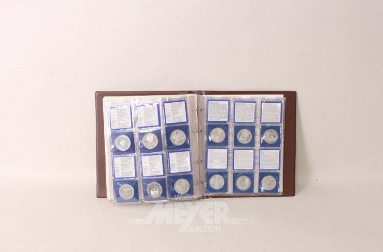 Münzalbum mit 80 Münzen