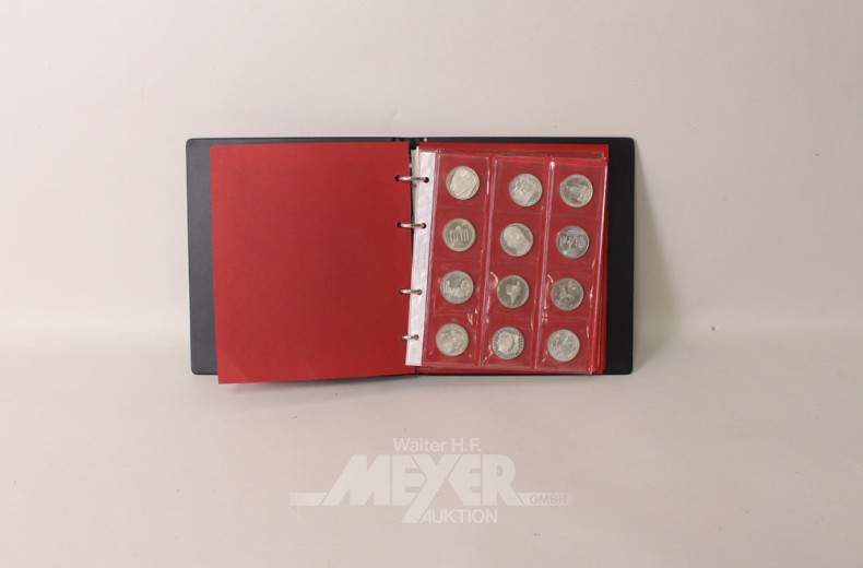 Münzalbum mit 70 Münzen